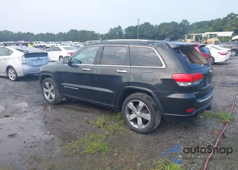 2014 Jeep Grand Cherokee Overland z USA, uszkodzony, nr VIN 1C4RJFCGXEC528487